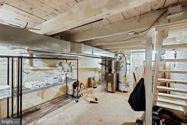 unfinished basement with heating unit and strapped water heater