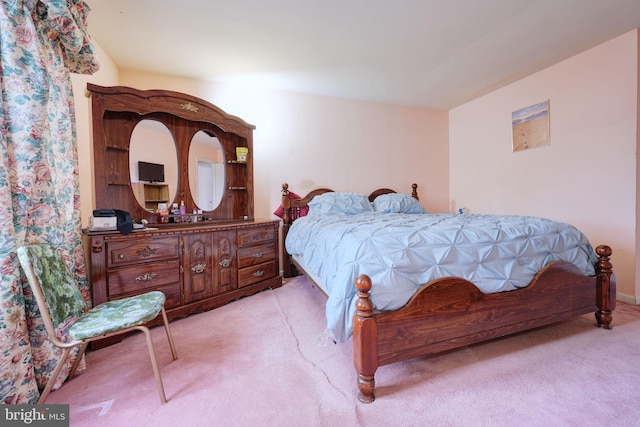 bedroom with light carpet