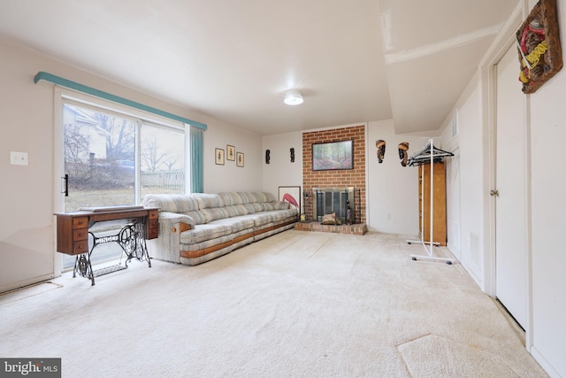 living area featuring a brick fireplace and light colored carpet