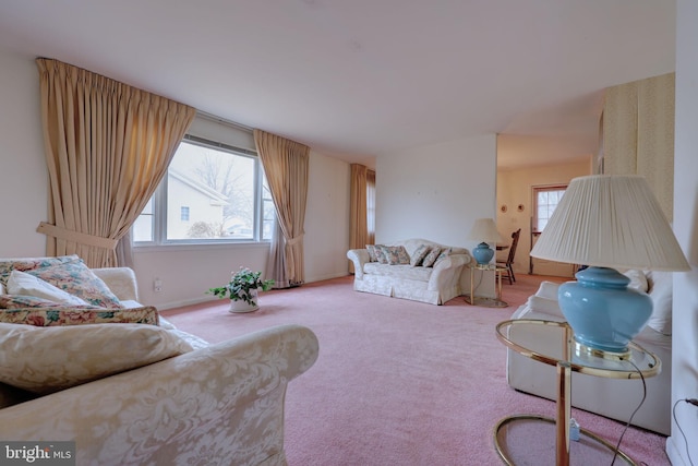 living area with light colored carpet