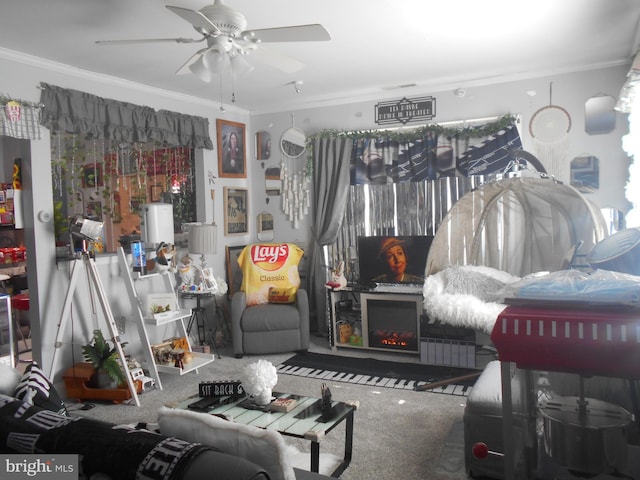 living room featuring carpet, crown molding, and ceiling fan