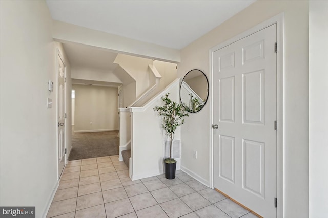 view of tiled foyer entrance