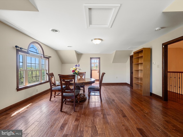 dining area with a healthy amount of sunlight, baseboards, dark wood-style floors, and visible vents
