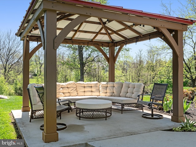 view of patio / terrace with an outdoor living space and a gazebo