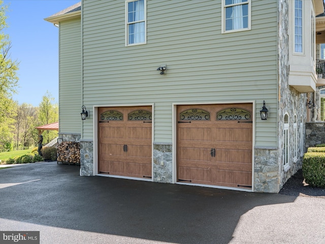 garage featuring driveway