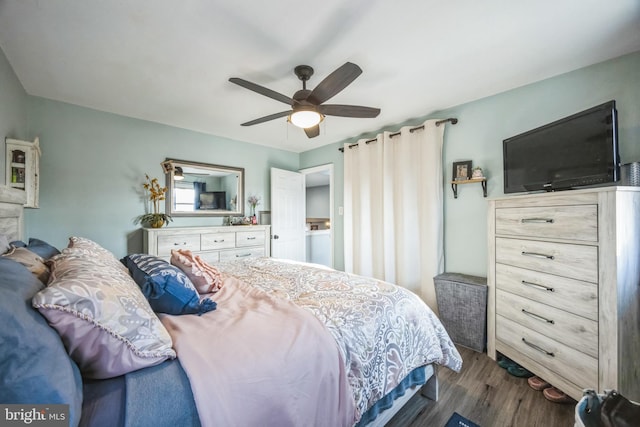 bedroom featuring dark hardwood / wood-style floors and ceiling fan