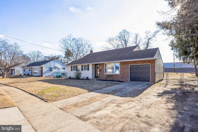 ranch-style home with a garage