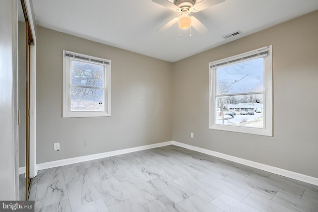 spare room featuring ceiling fan