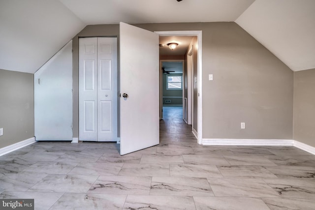 bonus room with vaulted ceiling