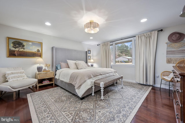 bedroom featuring dark hardwood / wood-style flooring