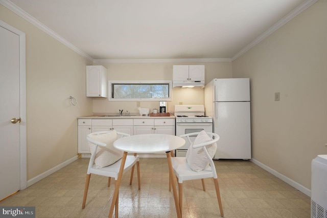 kitchen with sink, ornamental molding, white appliances, and white cabinets