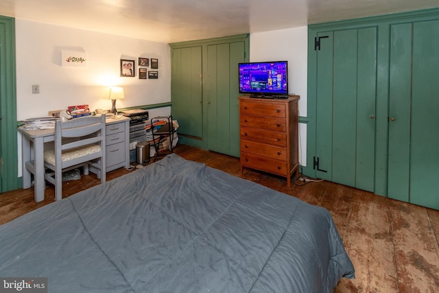 bedroom with wood finished floors