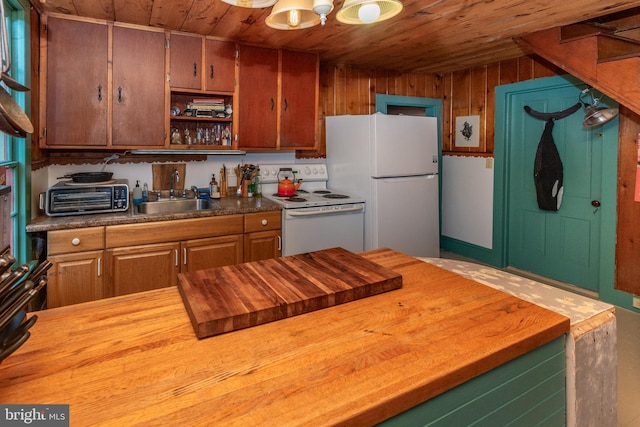 kitchen featuring a toaster, white appliances, wood ceiling, and a sink