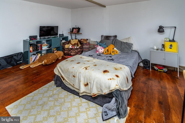 bedroom featuring wood-type flooring