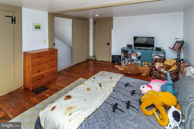 bedroom with wood finished floors