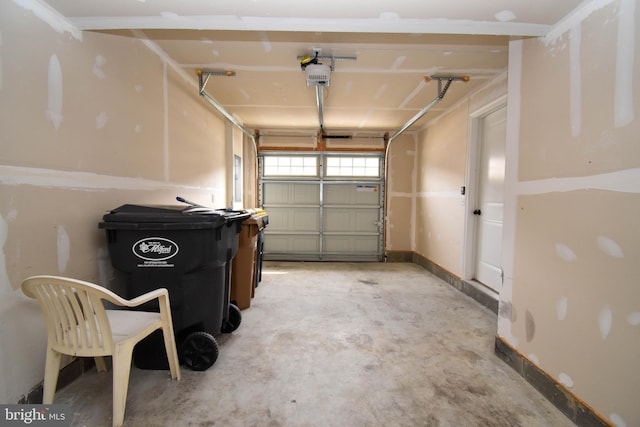 garage featuring a garage door opener