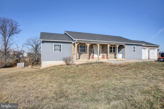 single story home featuring a front yard and a garage