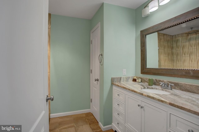 bathroom with vanity and tile patterned flooring