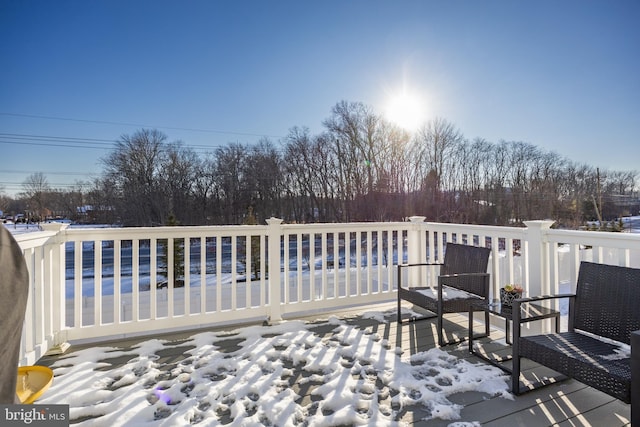 view of snow covered deck