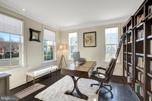 home office featuring crown molding, baseboards, and dark wood-type flooring