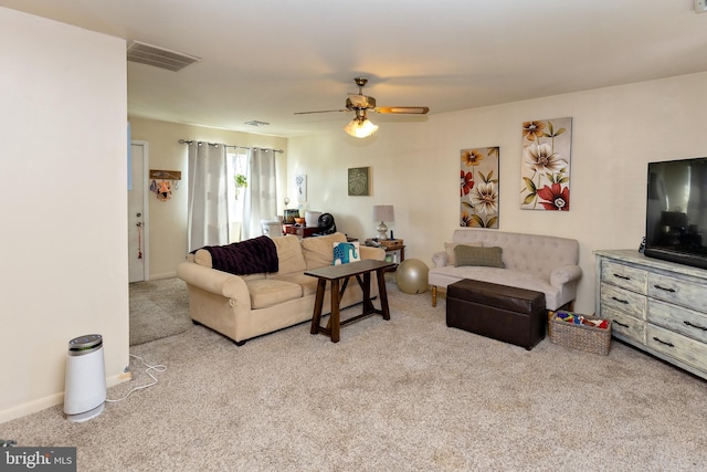 living room featuring ceiling fan and light colored carpet