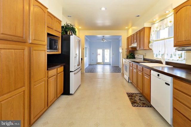 kitchen with sink, french doors, white appliances, and ceiling fan