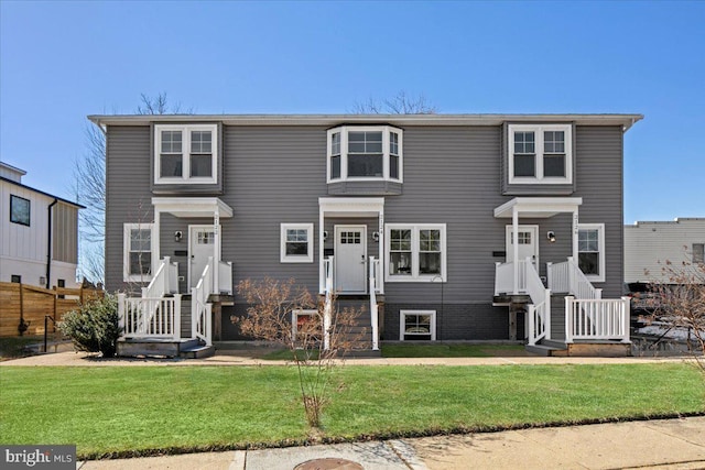 view of front of house with a front lawn