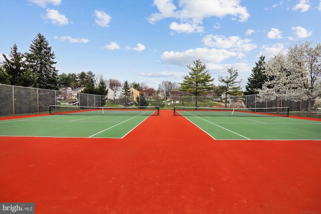 view of tennis court featuring basketball court