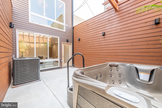 217 Tasker St, Philadelphia, PA 19148 - view of patio / terrace with a hot tub and central AC unit