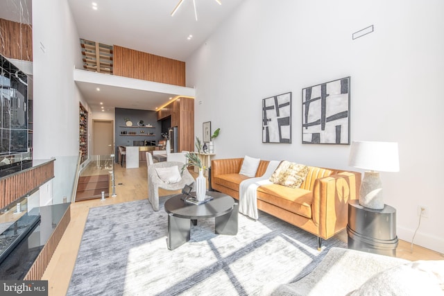 217 Tasker St, Philadelphia, PA 19148 - living room featuring a towering ceiling and wood finished floors