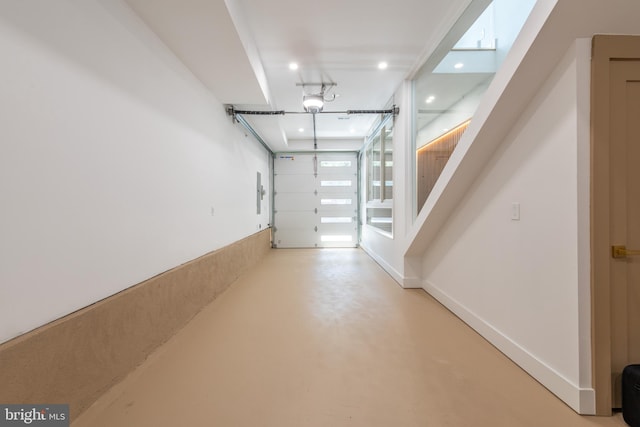 217 Tasker St, Philadelphia, PA 19148 - garage featuring baseboards and recessed lighting