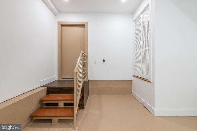 217 Tasker St, Philadelphia, PA 19148 - stairs with baseboards and recessed lighting