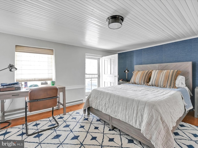 bedroom featuring wood finished floors