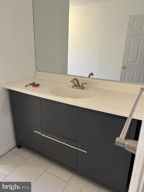 bathroom featuring vanity and tile patterned floors