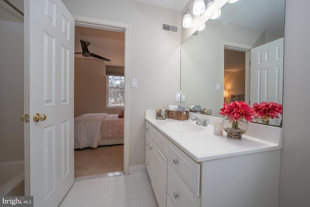 bathroom featuring visible vents, ensuite bathroom, a ceiling fan, and vanity