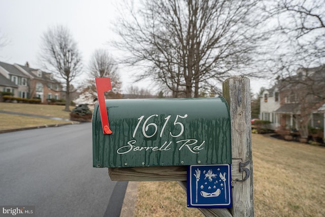 community sign with a lawn