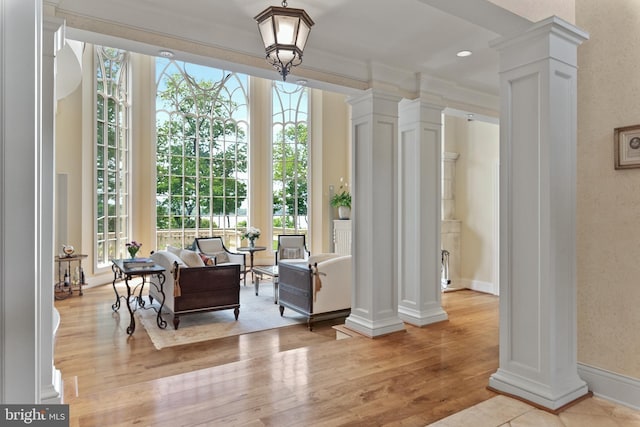 938 Old County Rd, Severna Park, MD 21146 - sitting room featuring ornate columns, recessed lighting, ornamental molding, and light wood finished floors
