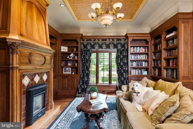 938 Old County Rd, Severna Park, MD 21146 - living area with light wood-style floors, a chandelier, and a fireplace