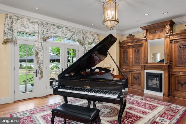 938 Old County Rd, Severna Park, MD 21146 - living area with french doors, recessed lighting, light wood finished floors, and a notable chandelier
