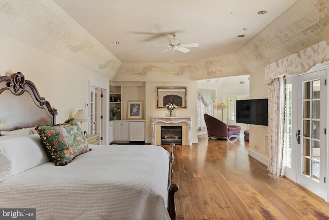 938 Old County Rd, Severna Park, MD 21146 - bedroom featuring visible vents, a high end fireplace, wood finished floors, and recessed lighting