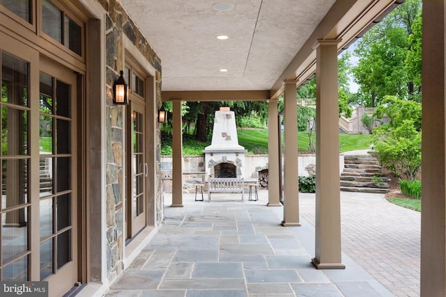 938 Old County Rd, Severna Park, MD 21146 - view of patio / terrace with an outdoor stone fireplace
