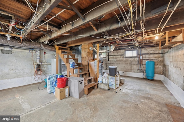 2832 Larkin Rd, Upper Chichester, PA 19061 - basement with a water pressure tank, stairway, and gas water heater