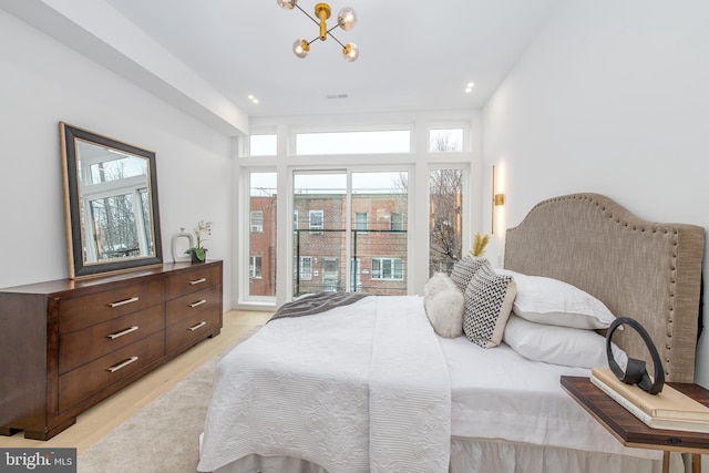 bedroom featuring light wood-style floors and recessed lighting