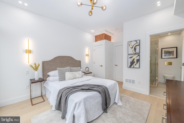 bedroom featuring recessed lighting, visible vents, baseboards, light wood-style floors, and an inviting chandelier