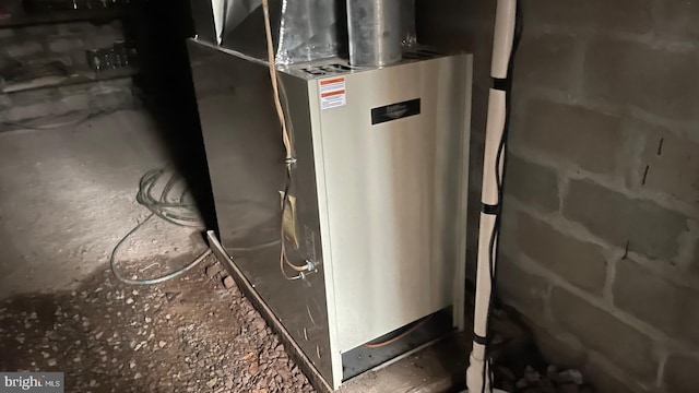 96 Jr Rannells, Three Churches, WV 26757 - utility room featuring heating unit