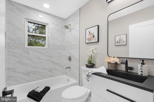 bathroom featuring  shower combination, toilet, and vanity