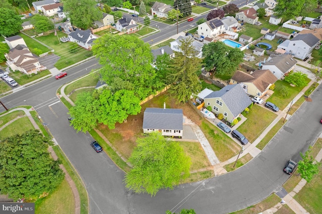 aerial view of property's location featuring nearby suburban area
