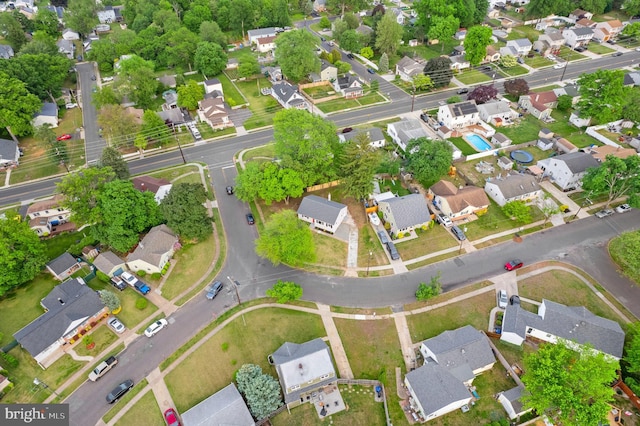 aerial view of property's location with nearby suburban area