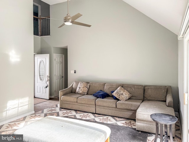 living room featuring high vaulted ceiling and ceiling fan