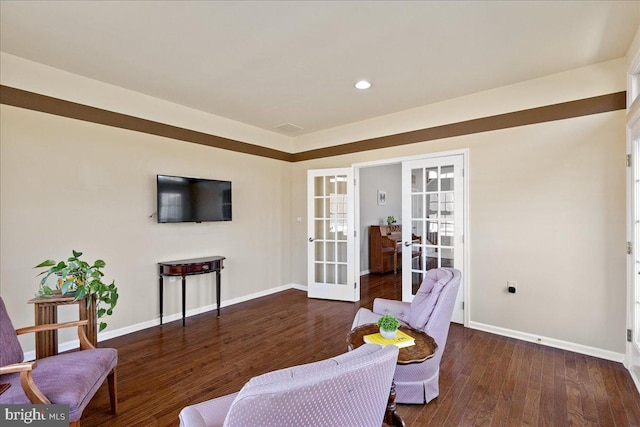 living area featuring recessed lighting, french doors, baseboards, and wood finished floors